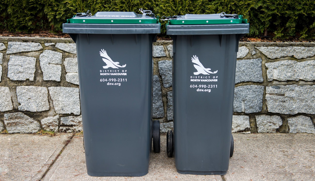Picture of new 140L and 240L garbage and organics carts with wheels and locking lids