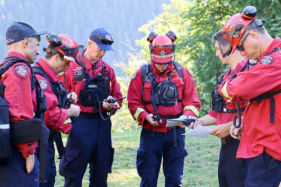A group of DNVFRS firefighters practise battling wildfires.