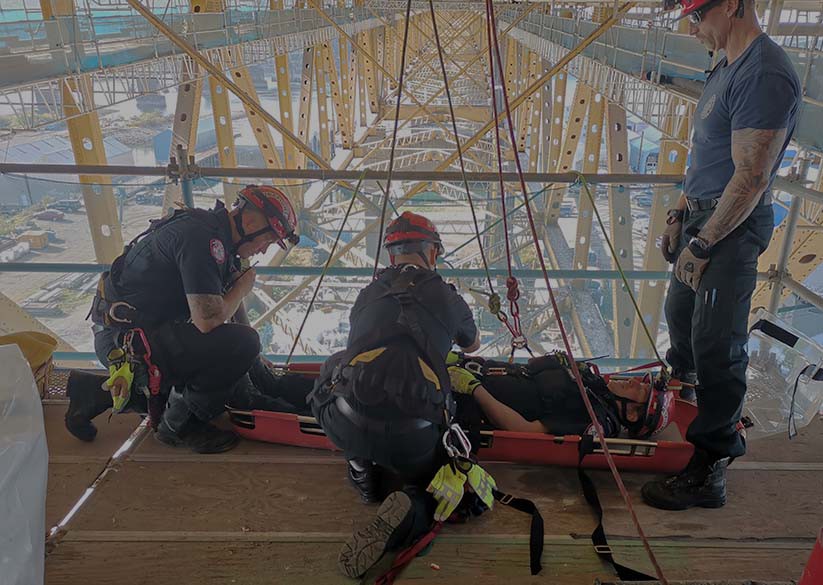DNVFRS firefighters conduct training underneath Second Narrows Bridge.
