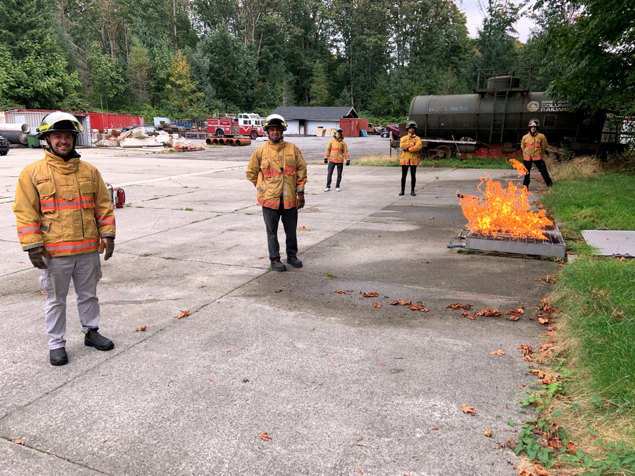 A group of firefighters participate in a training exercise. 