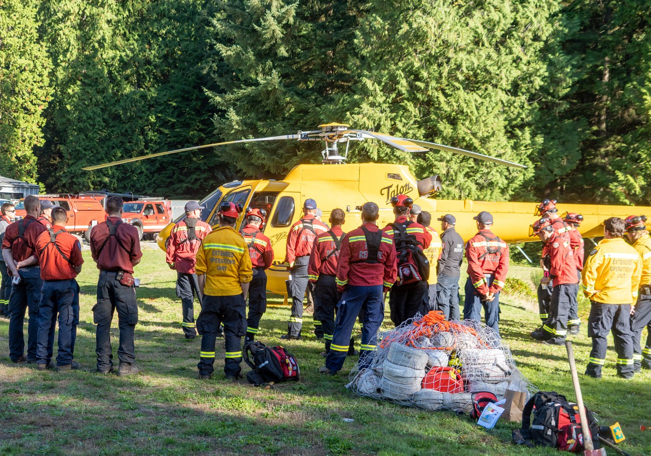Fire crew preparing to board a helicopter