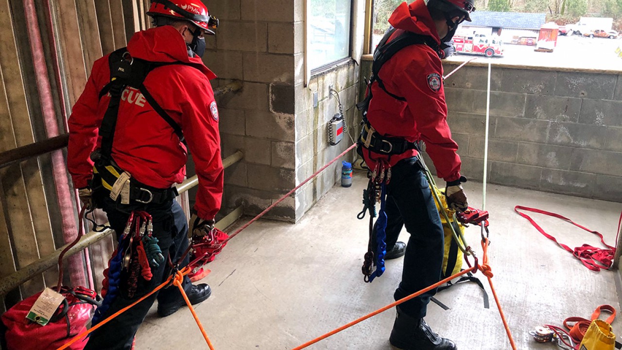 DNVFRS firefighters training for long line rescues.