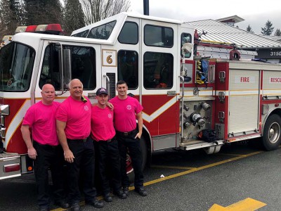 DNV firefighters dressed for pink shirt day.