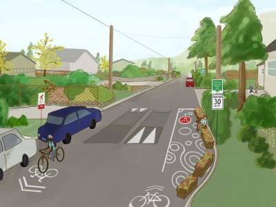 B.	Drawing of a woman riding a bicycle down a street with no sidewalks. There are vehicles parked on the street