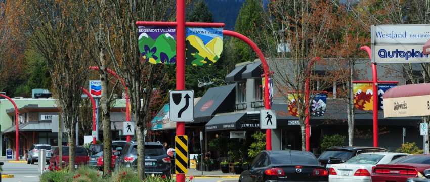 Cars driving through the centre of Edgemont Village